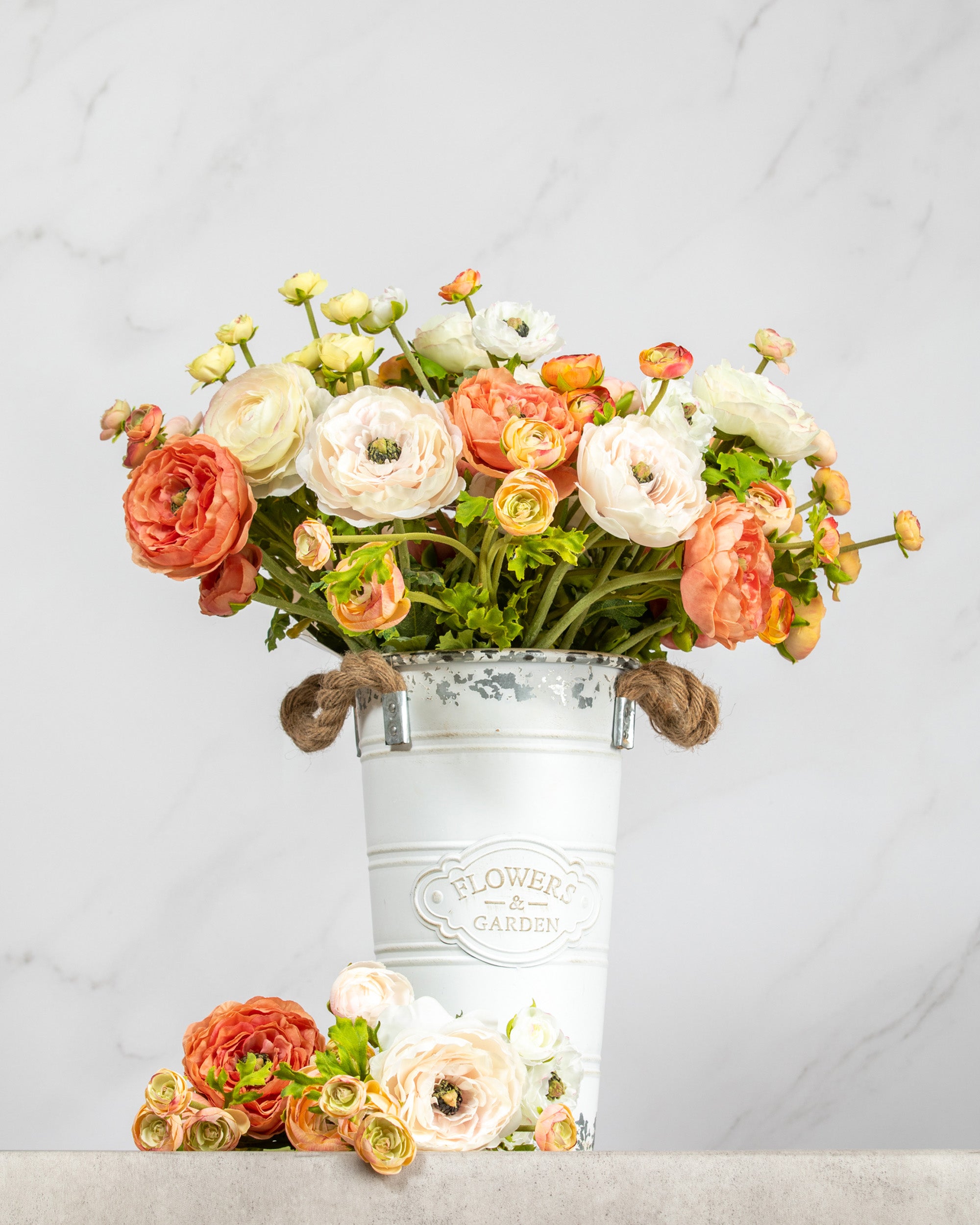 Prestige Botanicals Artificial Ranunculus in a white tin vase