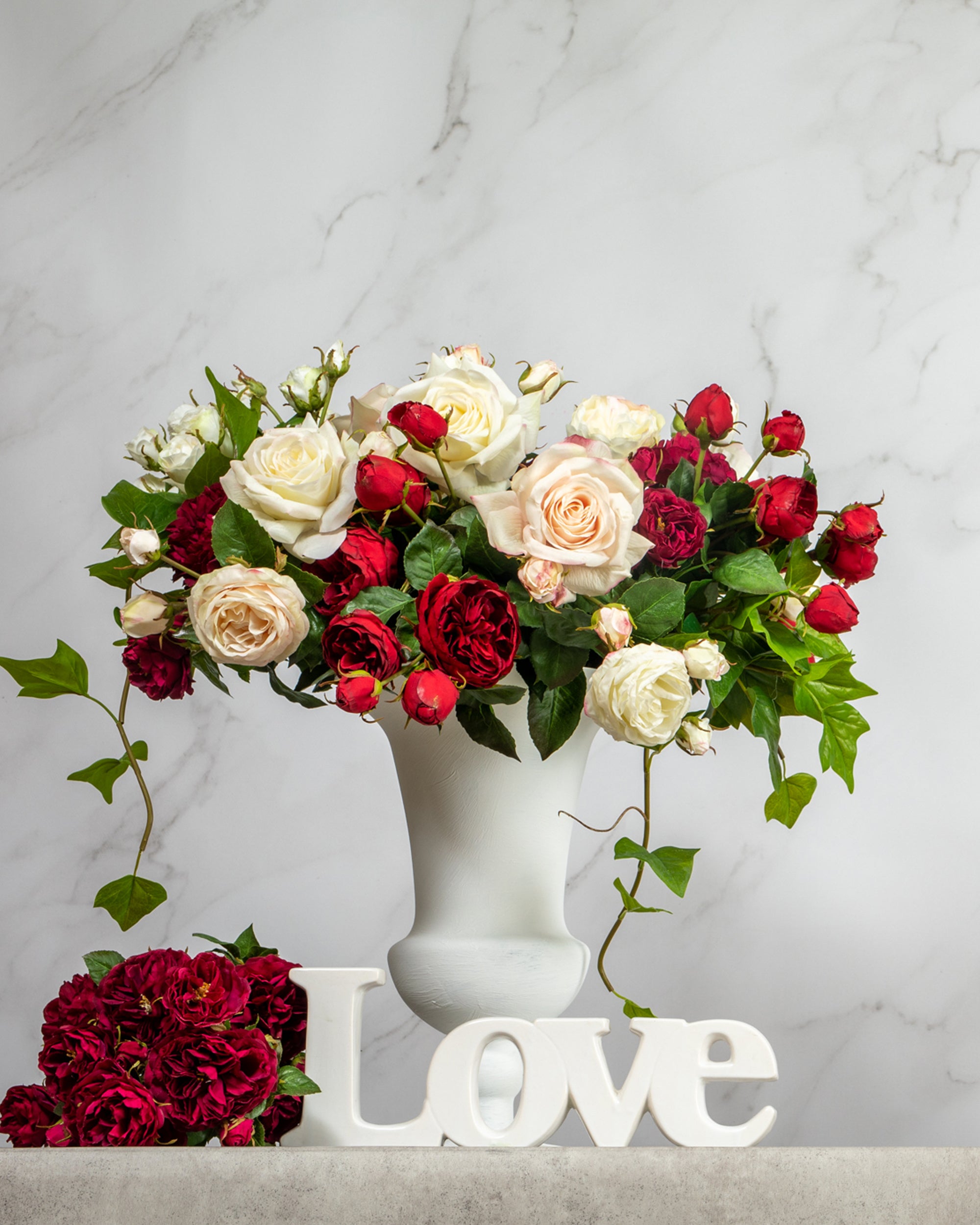 Prestige Botanicals Valentines Day Artificial Roses in a white vase