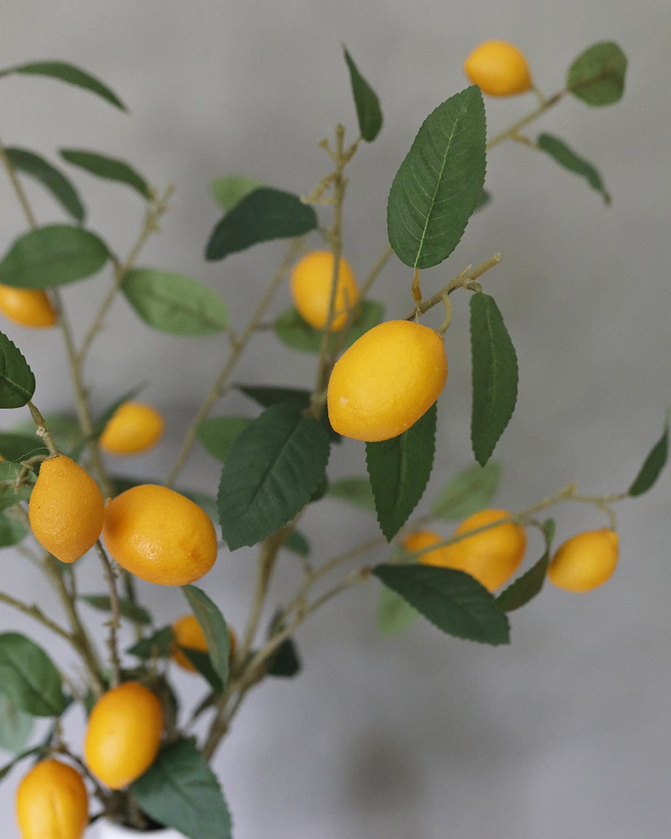 Details of Faux Lemon Leaf and Fruit Branches