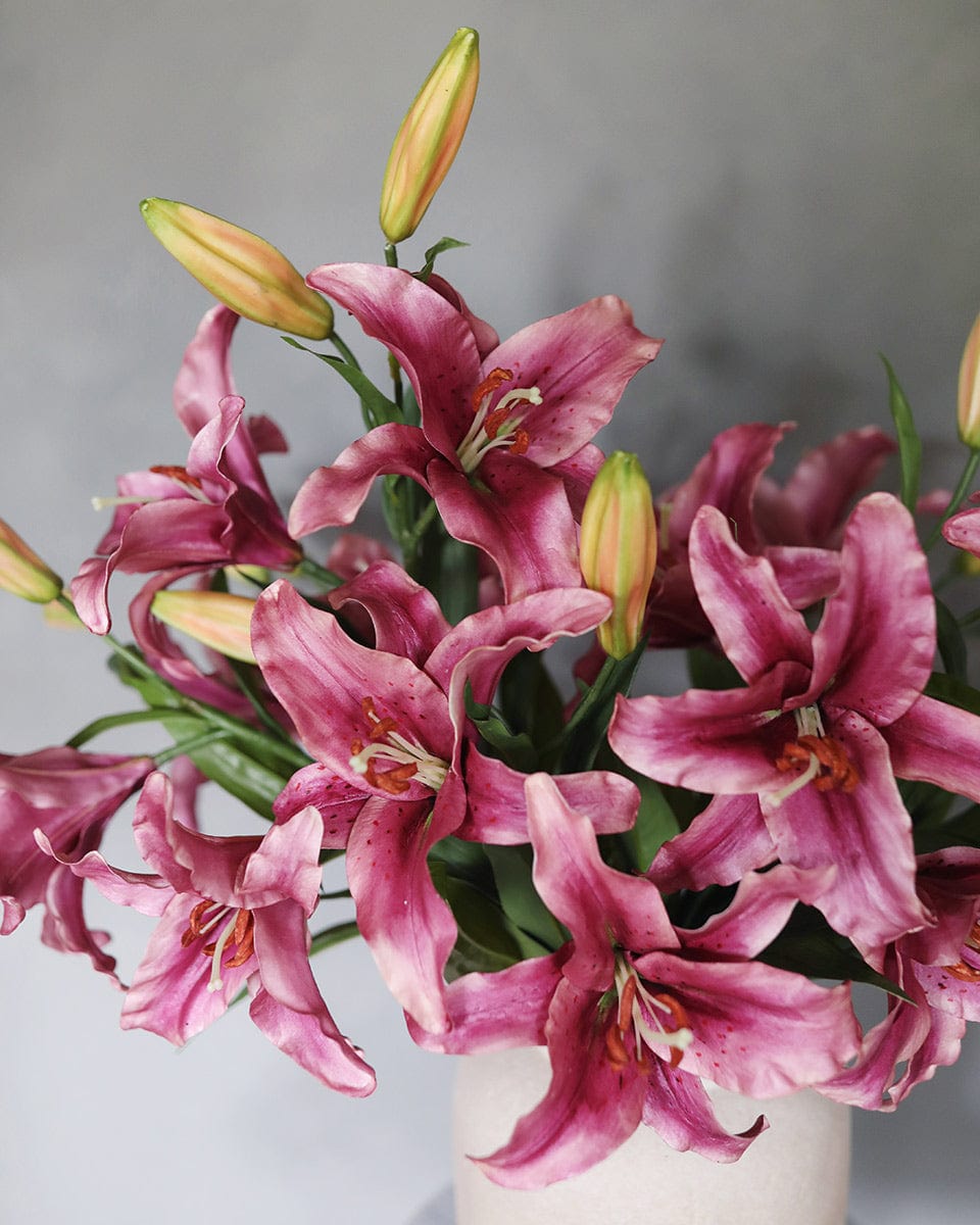 Close Up Image of Plum Pink Fake Lily Flower Bouquet