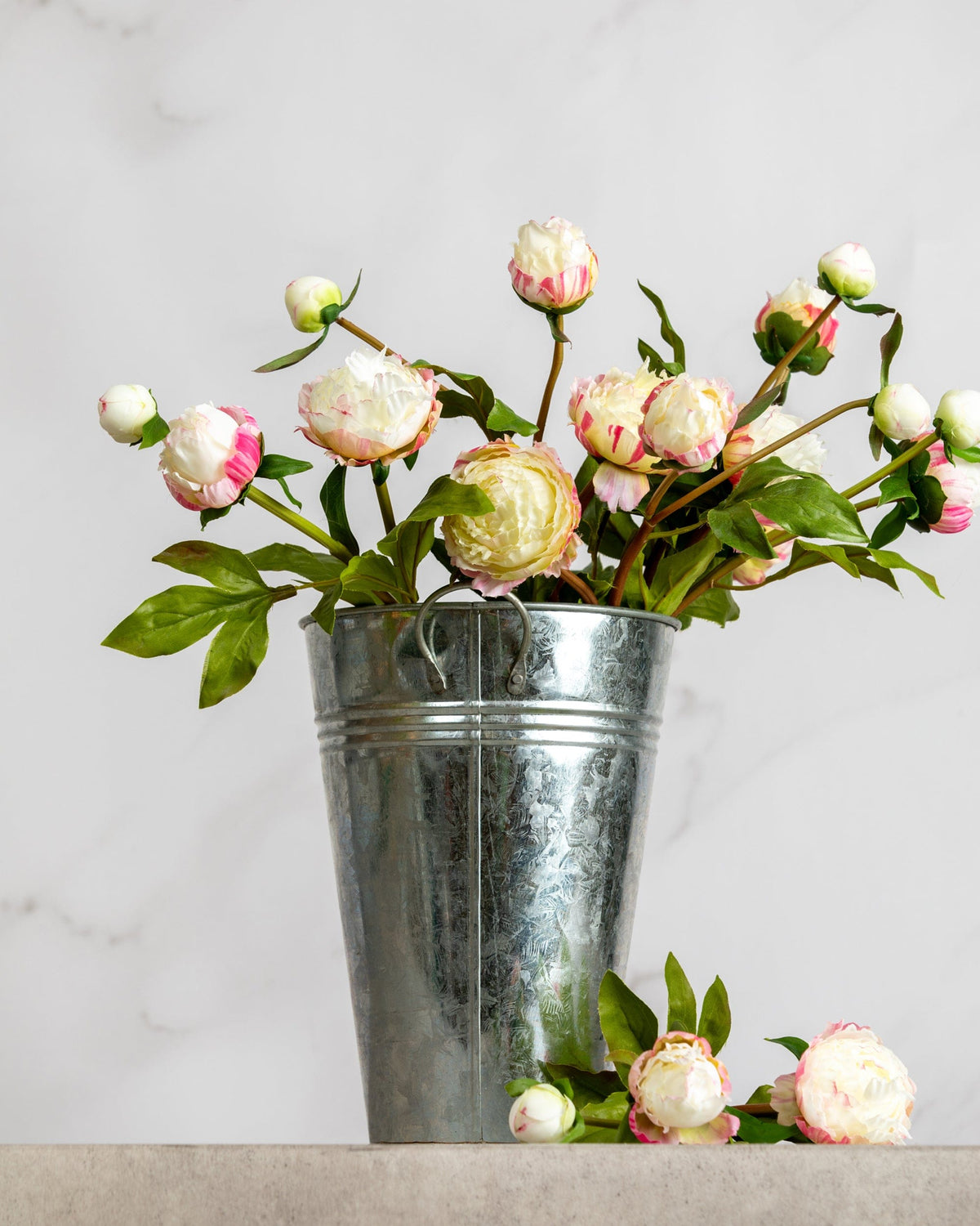 Prestige Botanicals Artificial White and Pink Peony bud sprays in a tin vase