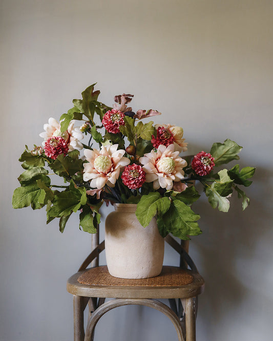 Fall Centerpiece with Artificial Dahlias, Blush Proteas, and Fig Leaves and Fruit