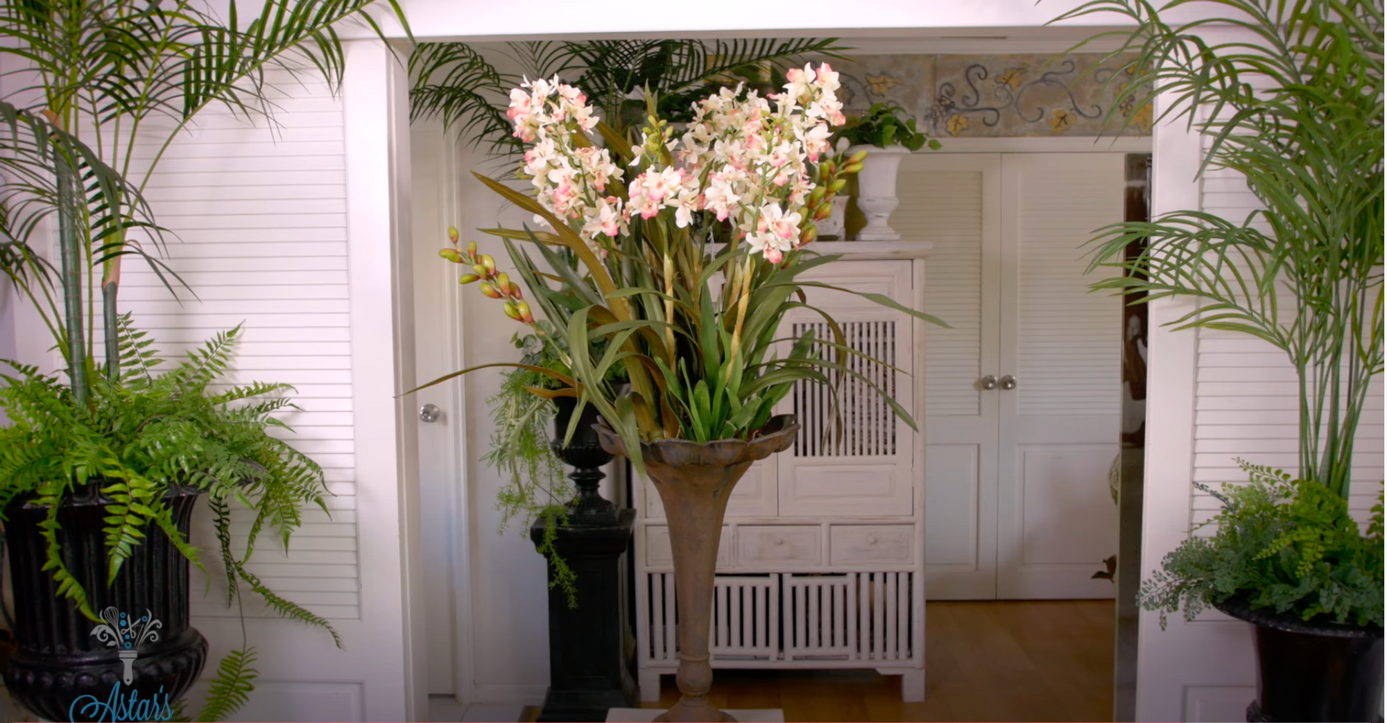 Delightful Dendrobium Orchid plant into a rustic metal urn