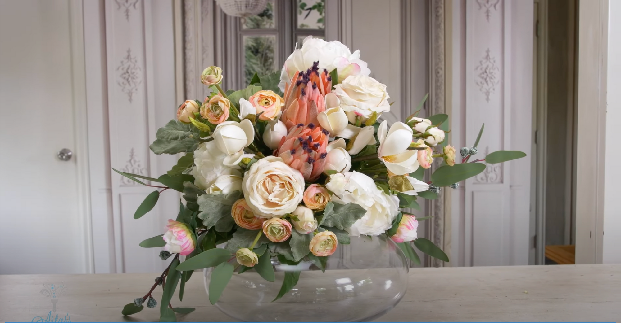 A Bridal Bouquet: Pink Mink Protea, White Peonies, Roses, Ranunculus & Magnolia