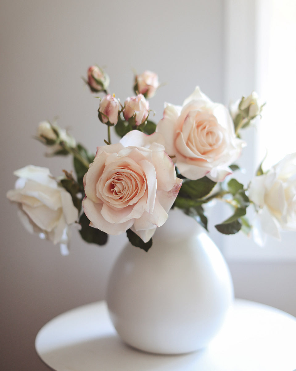 Prestige Botanicals Artificial Roses in a white vase