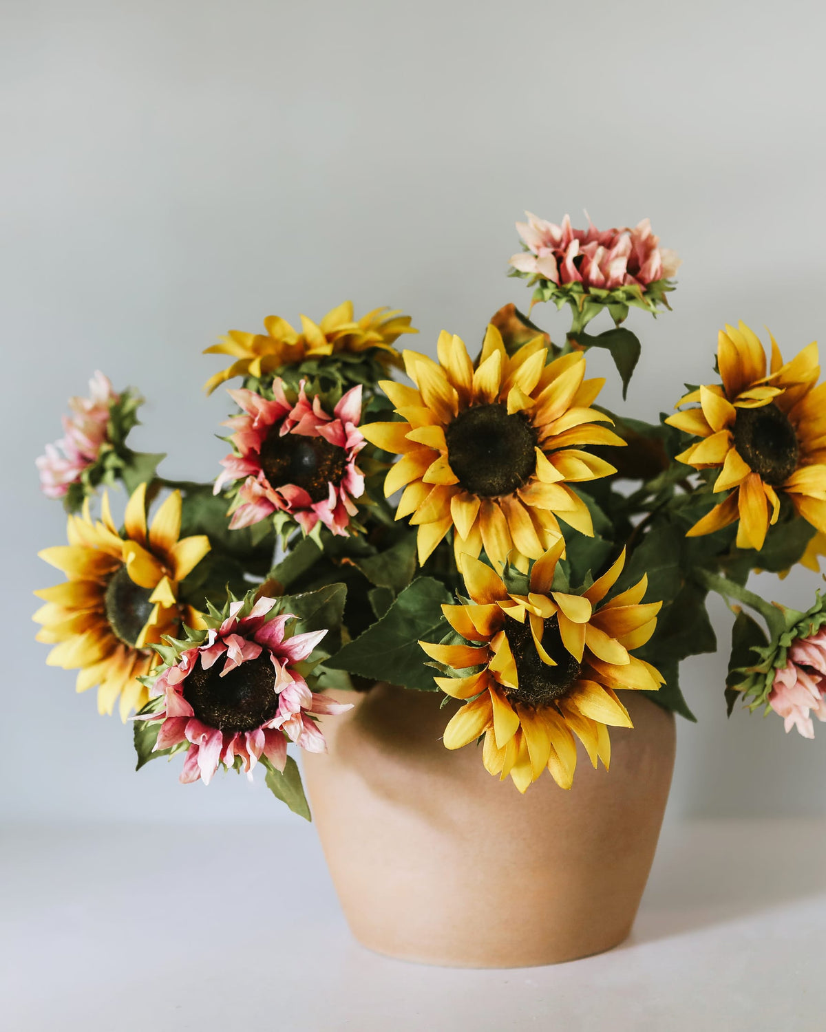 Faux Purple and Yellow Sunflowers in a vase