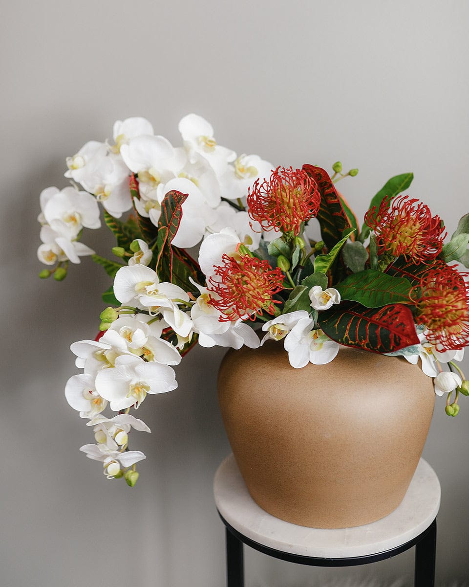 Tropical Flowers Fake Proteas and White Cascading Orchids