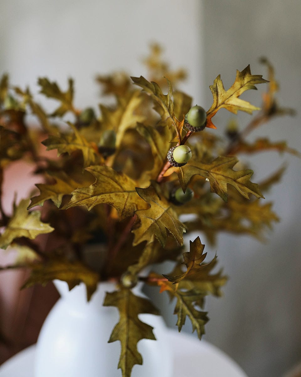 Close Up Photo of Artificial Oak Leaves with Faux Acorns