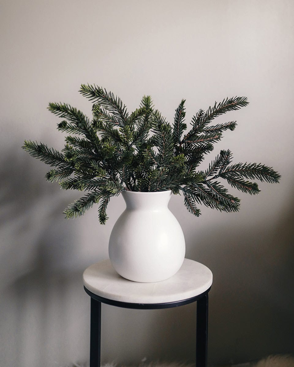 Fake Cedar Pine Branches Placed in Ceramic Vase