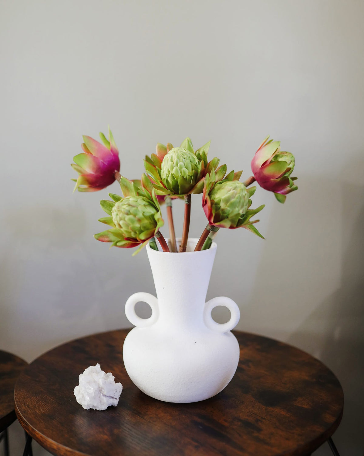 faux green waratahs in a vase 
