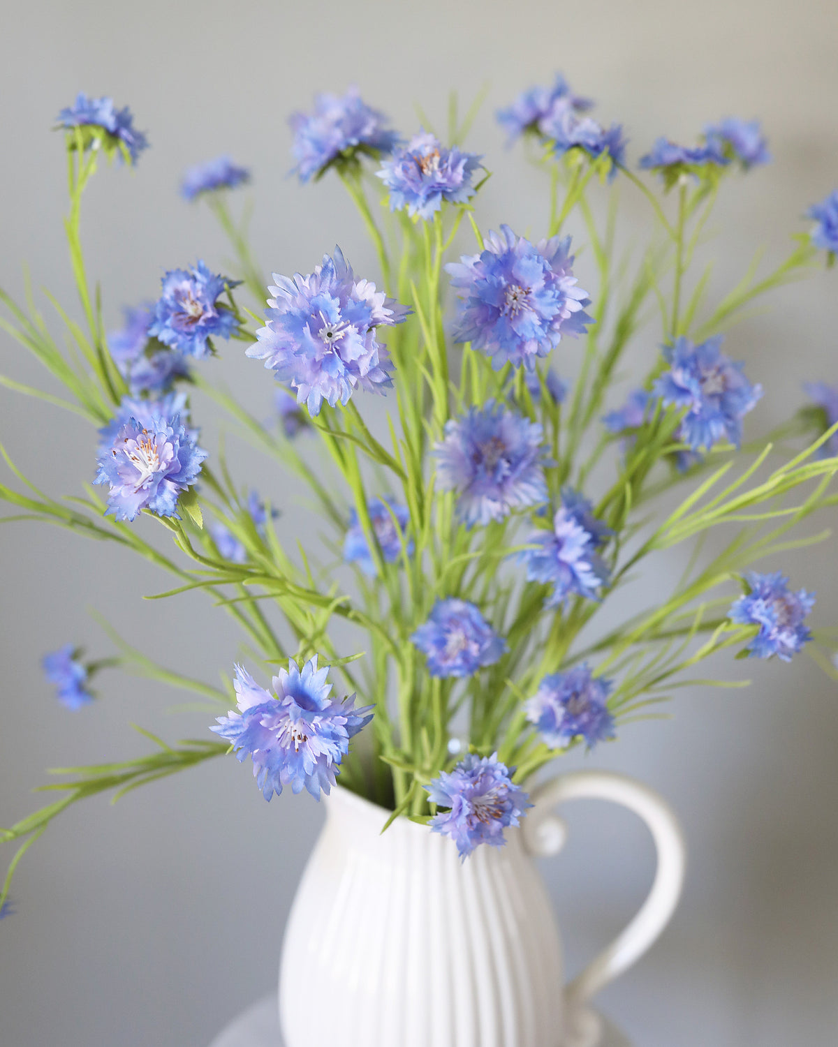 Artificial Blue Corn flower wildflowers in a vase
