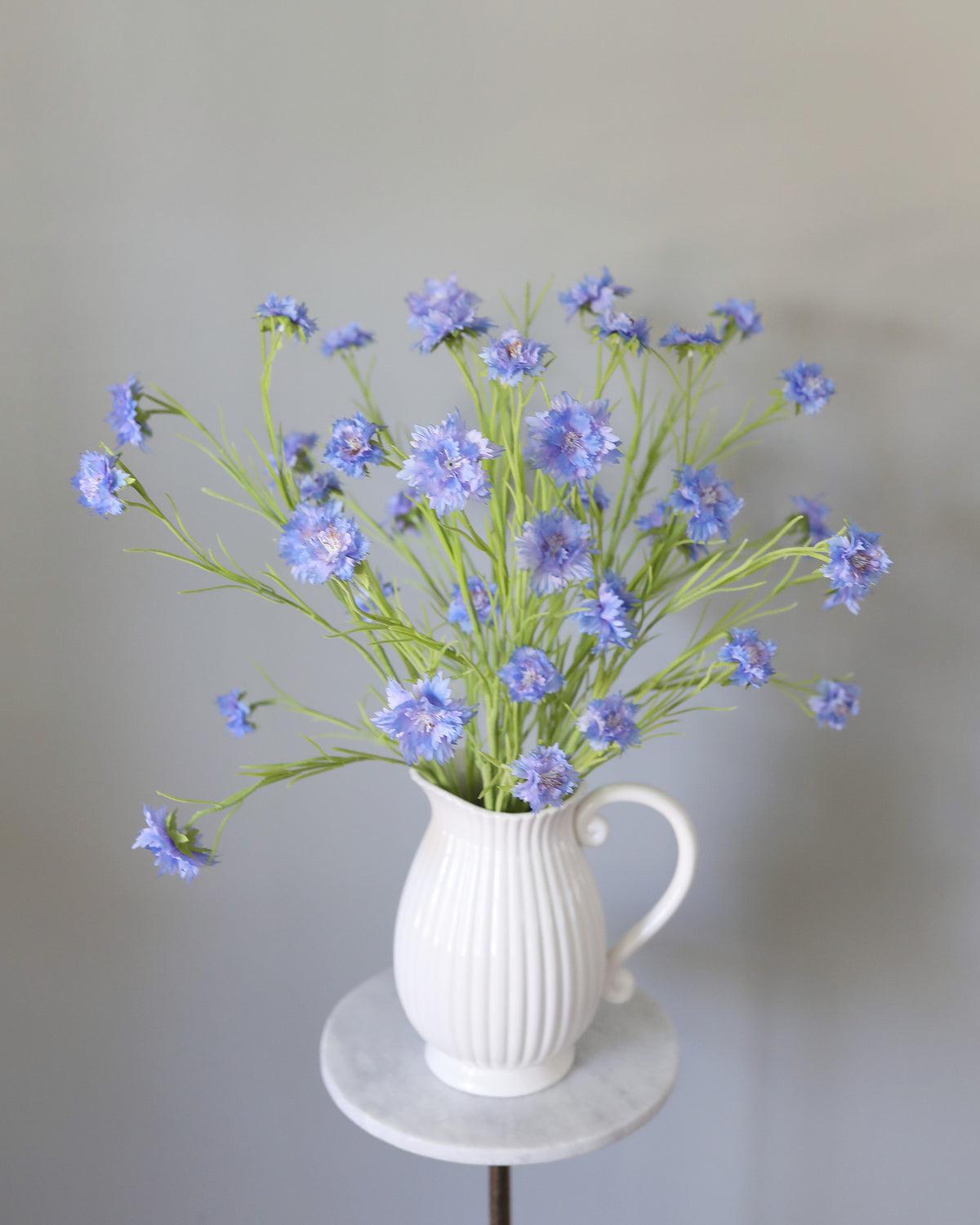 Artificial Blue Corn flower wildflowers in a vase