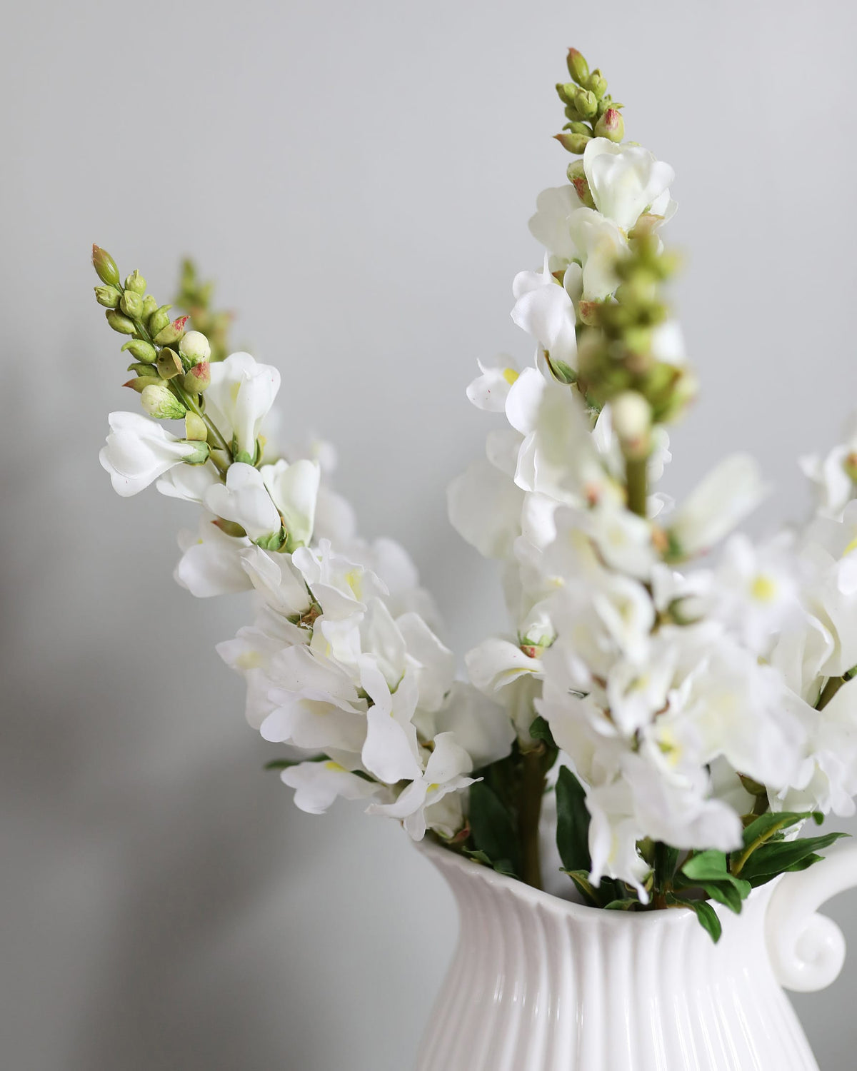 faux white snapdragon close up