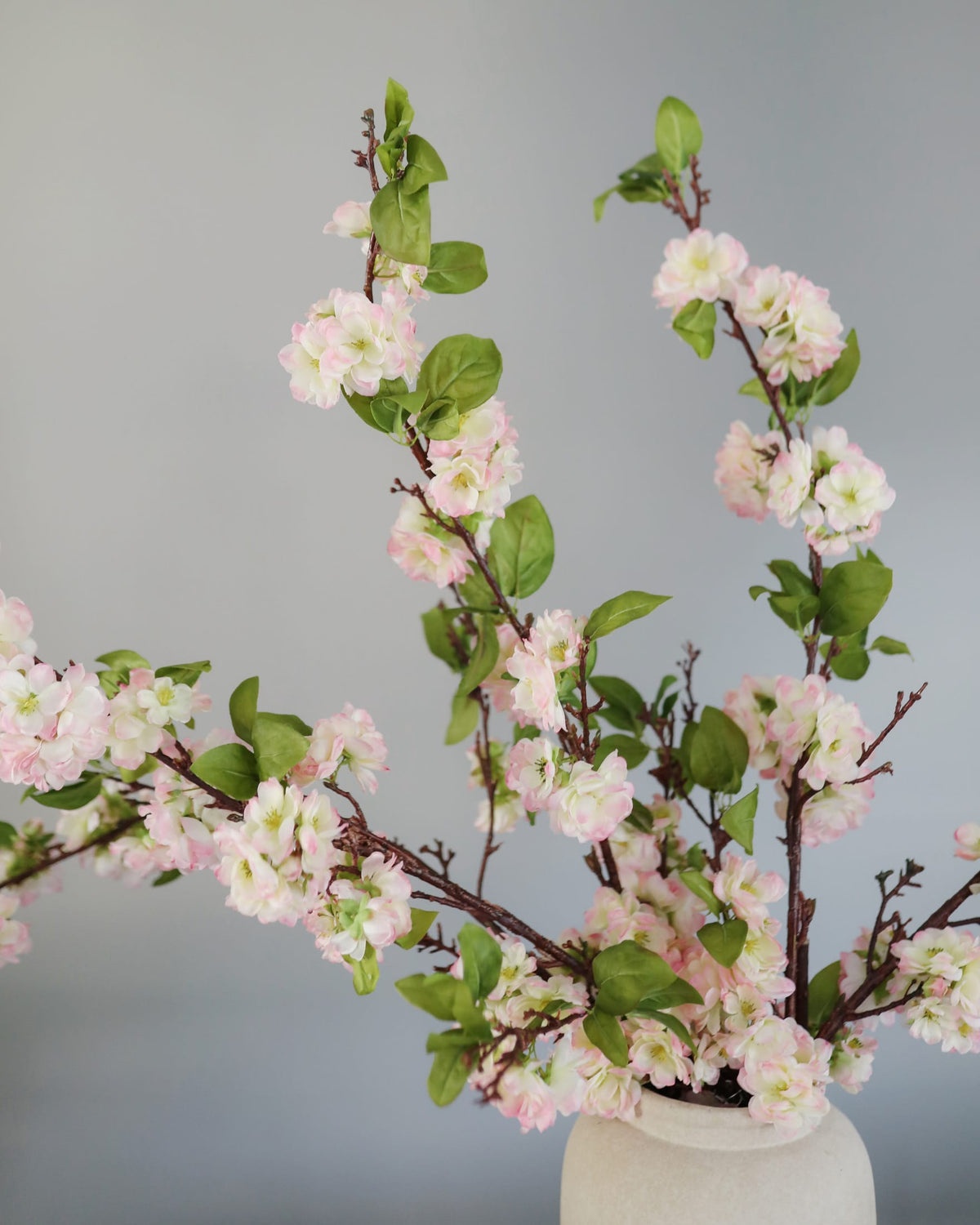 Faux Pink Cherry Blossom Branches in a vase
