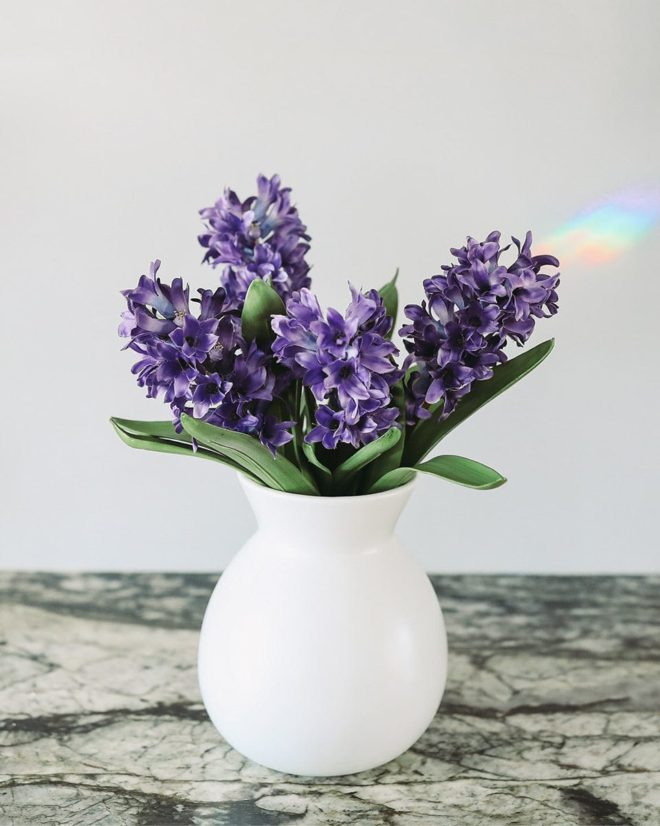 Artificial Spring Lilacs in White Vase