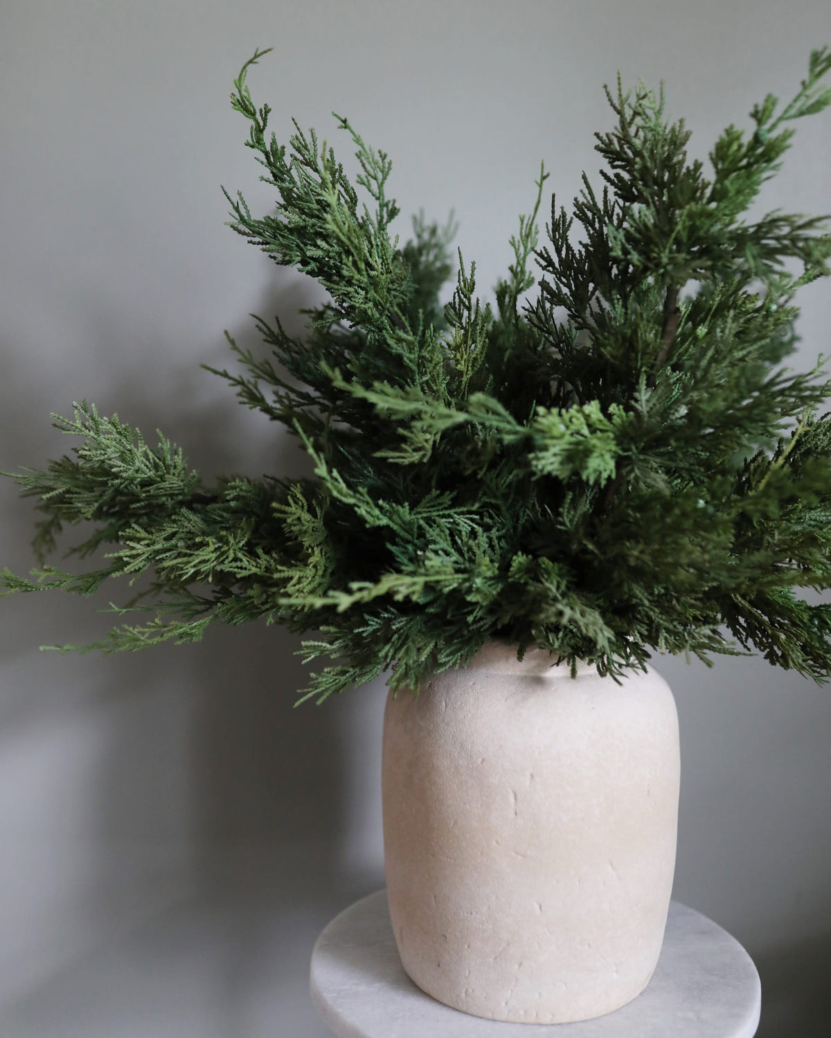 Faux Cedar Pine Branches in a vase
