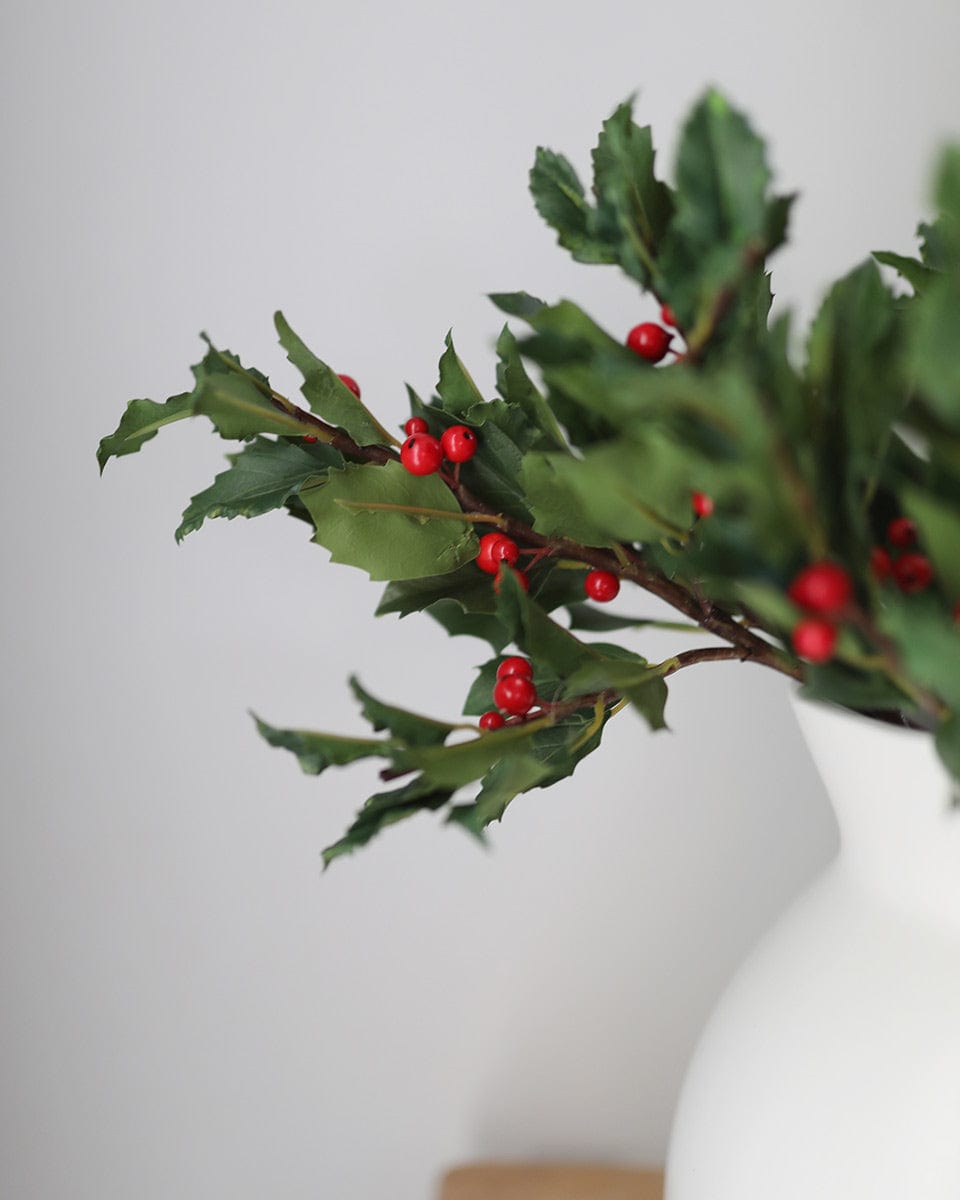 Close Up Details of Fake Holly Berries and Leaves