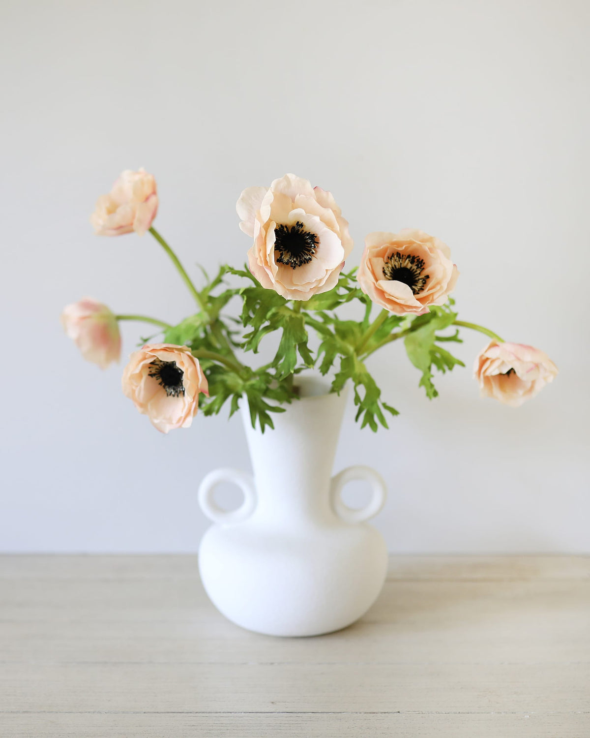 faux pale blush anemones in a vase