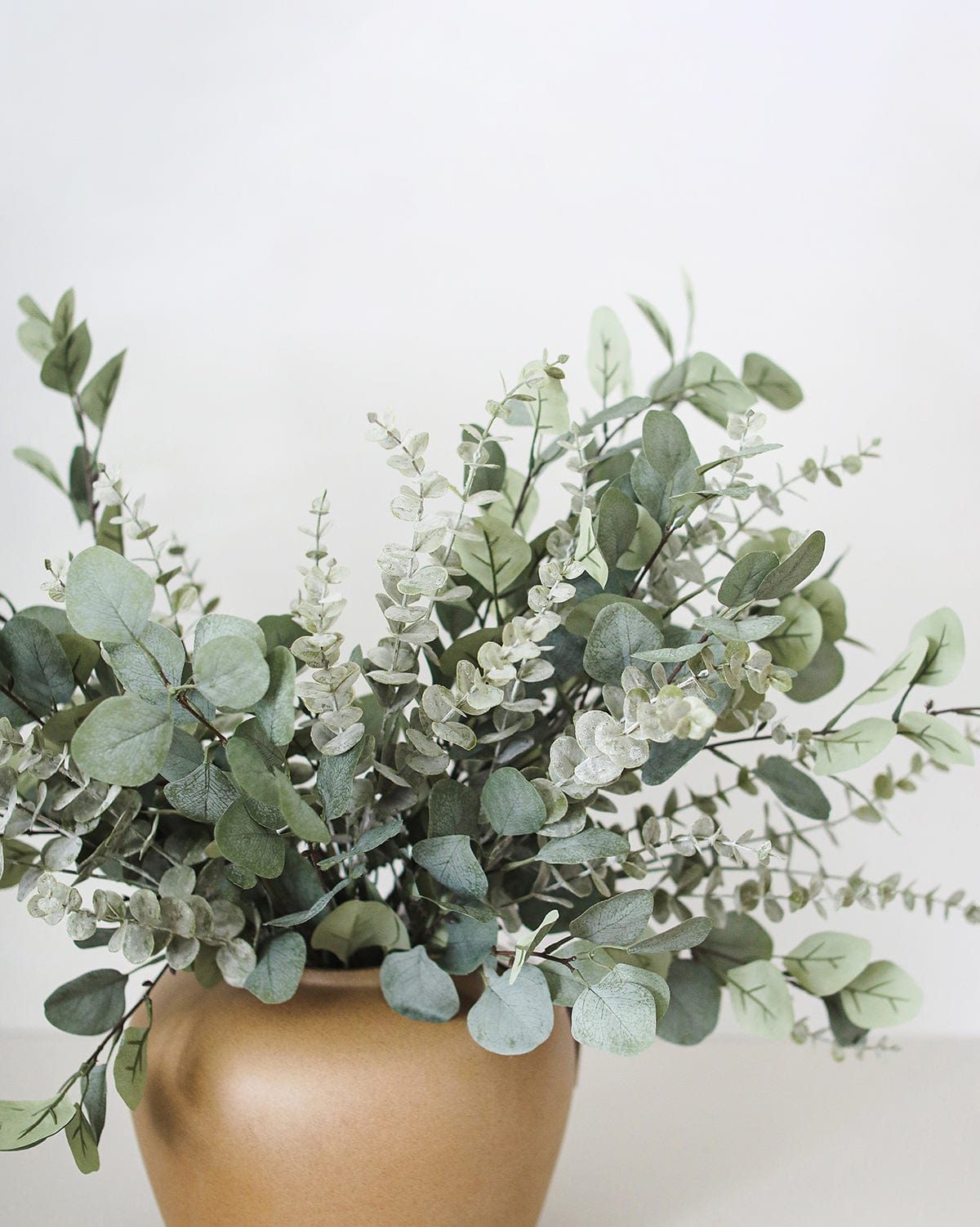 Artificial Eucalyptus Leaves Styled in Ceramic Vase