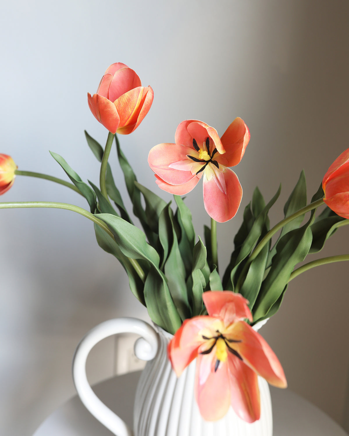 Artificial Orange Yellow Tulips in a vase