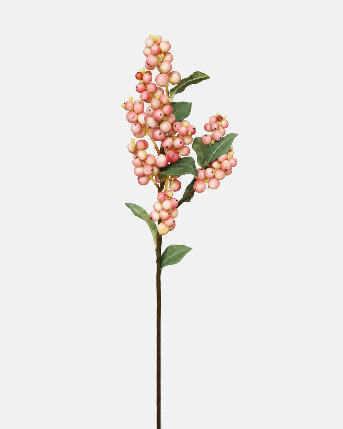 An artificial branch with clusters of pink berries and green leaves on a long dark stem, isolated on a light gray background.