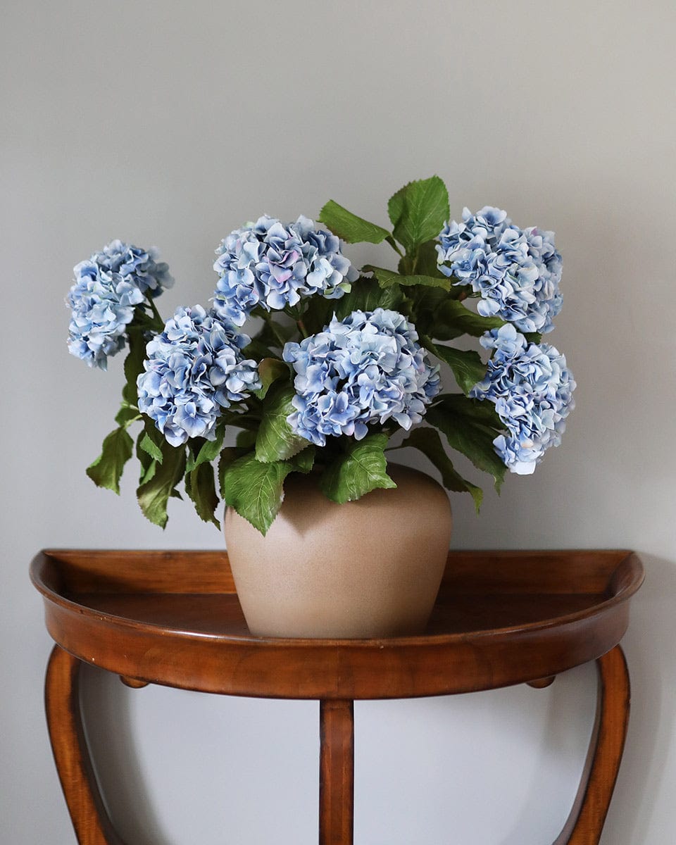 Fake Flower Arrangement Made with Blue Double Hydrangeas