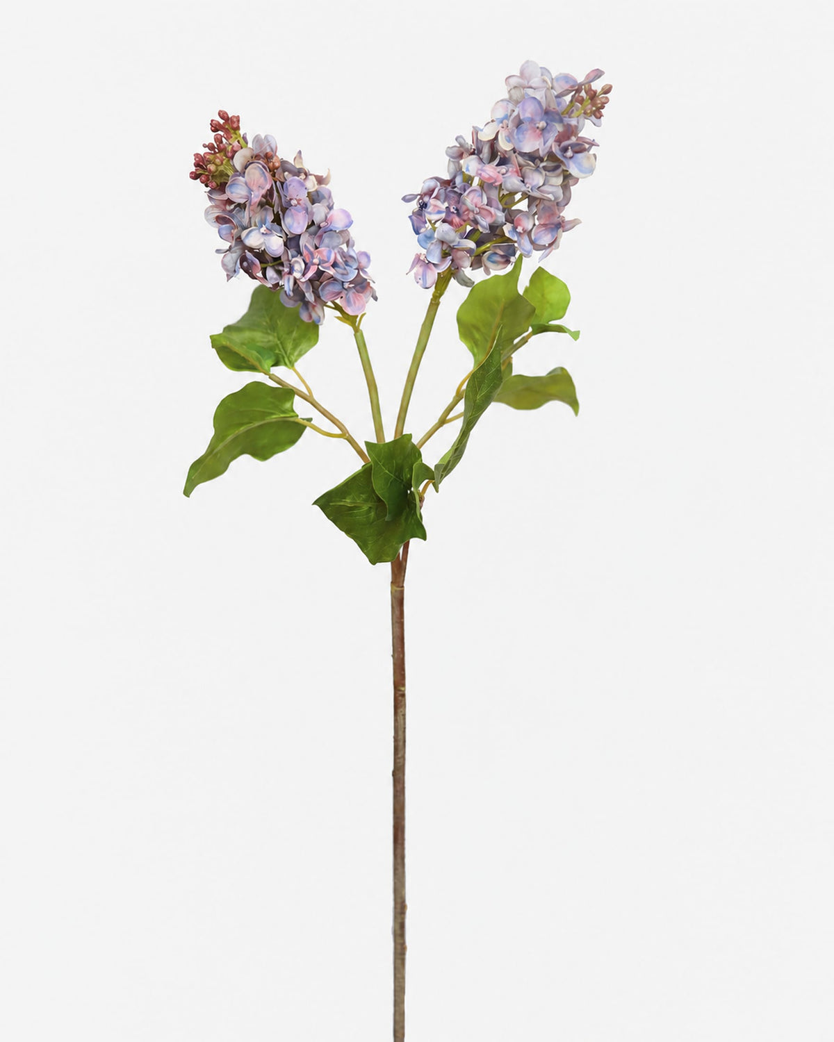 An artificial lilac stem featuring two clusters of light purple and blue blossoms with green leaves on a plain white background.