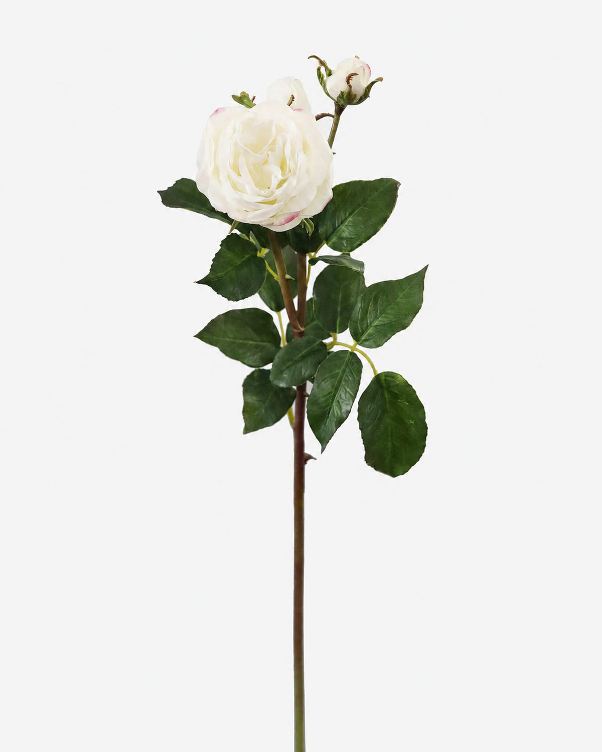 Artificial white real touch rose stem with green leaves and buds on a light gray background.