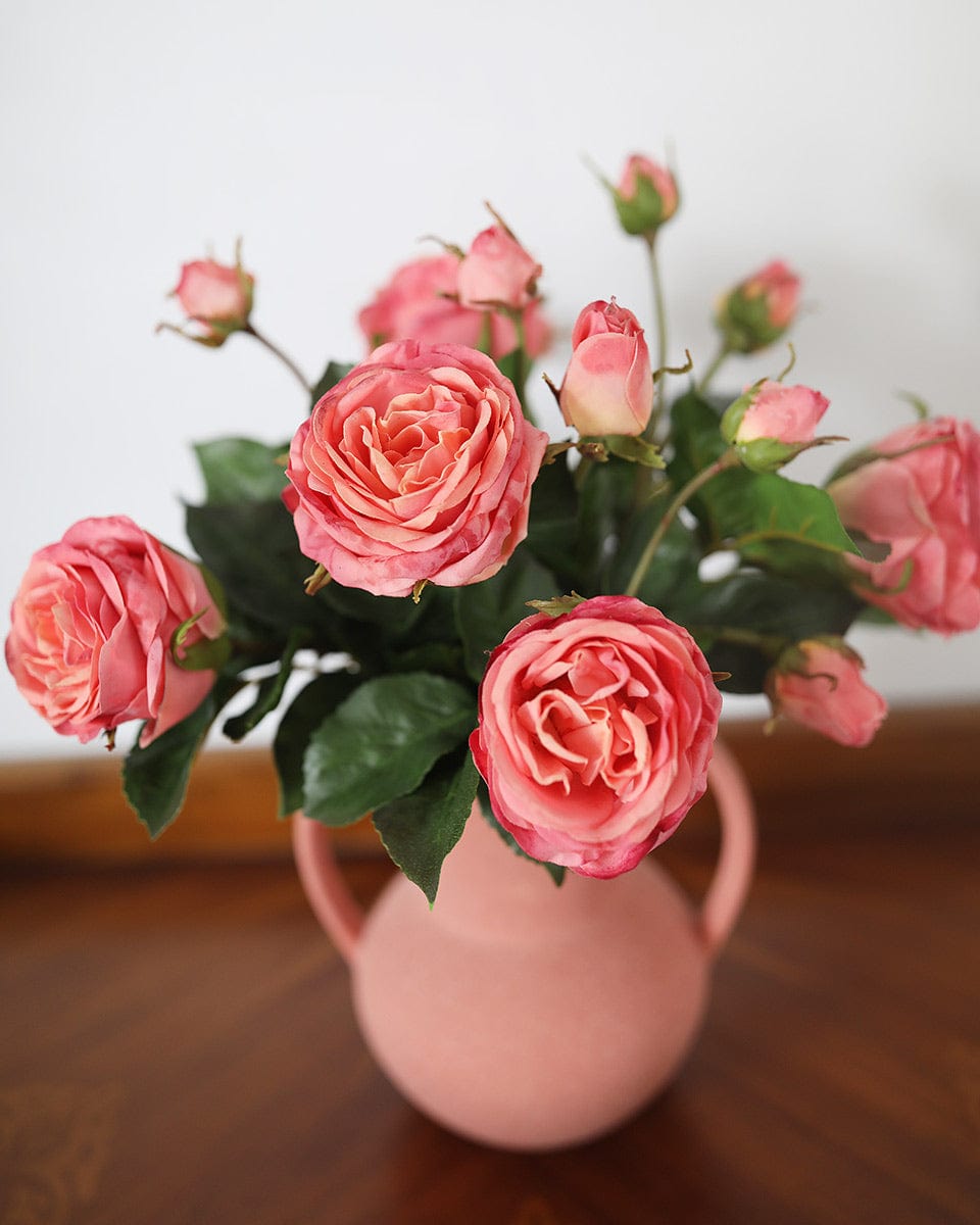 Close Up Shot of Real Touch Artificial Roses in Coral Color Arranged in Vase