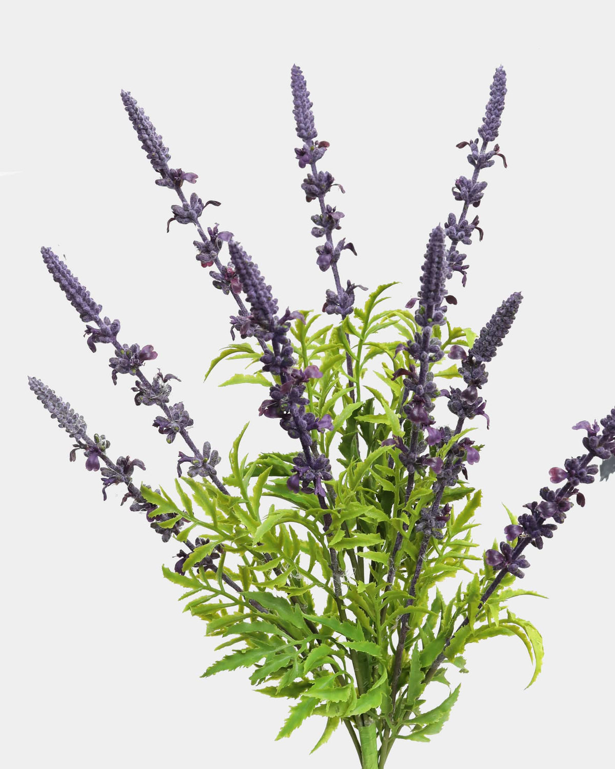 Artificial lavender plant with purple flowers on a white background