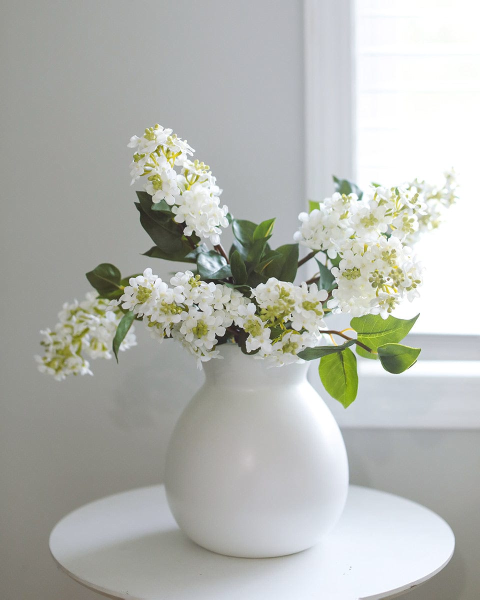 Artificial Spring Lilacs in White in Ceramic Vase