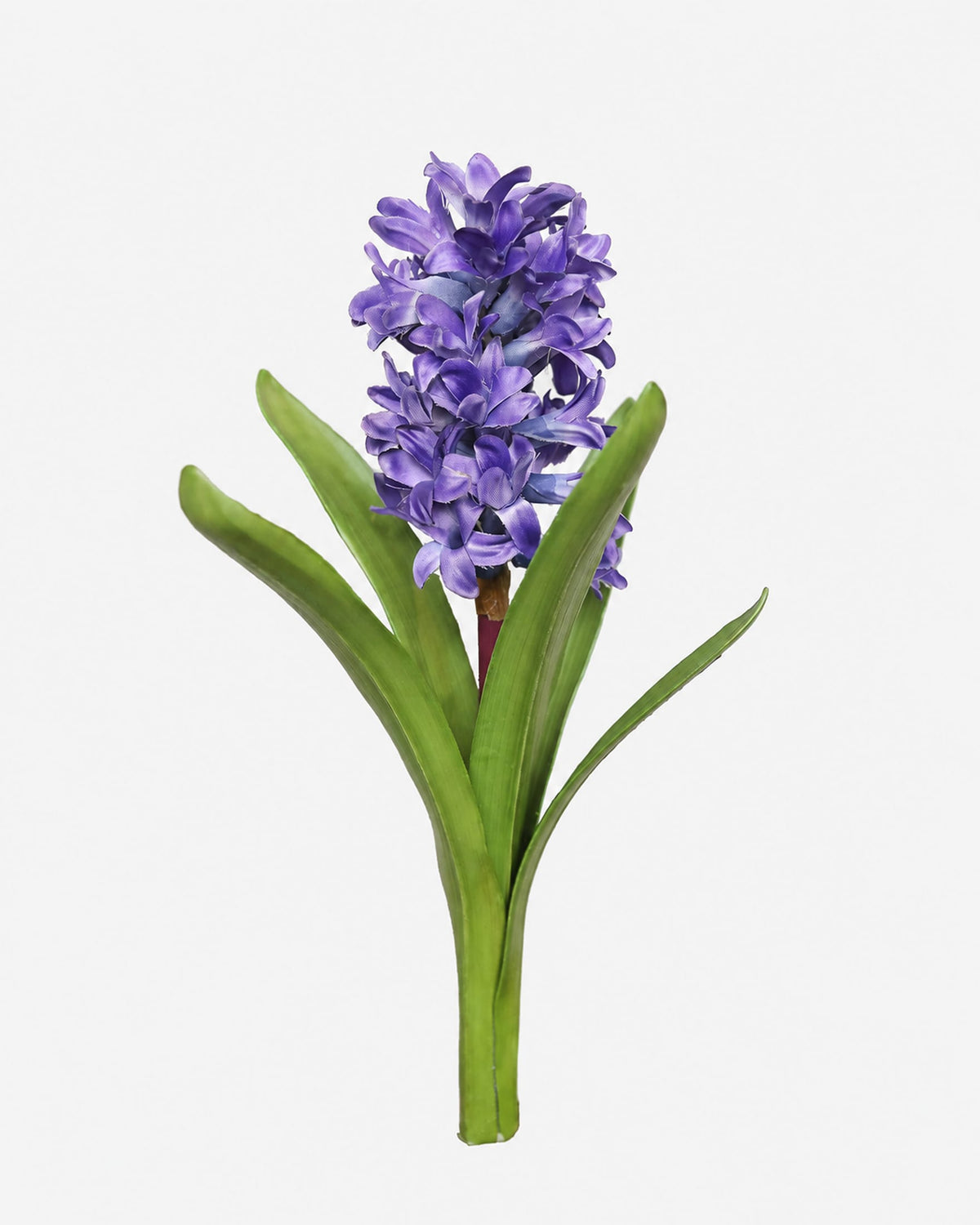 A single artificial hyacinth flower with a dense cluster of purple-blue blossoms and green leaves on a plain light gray background.