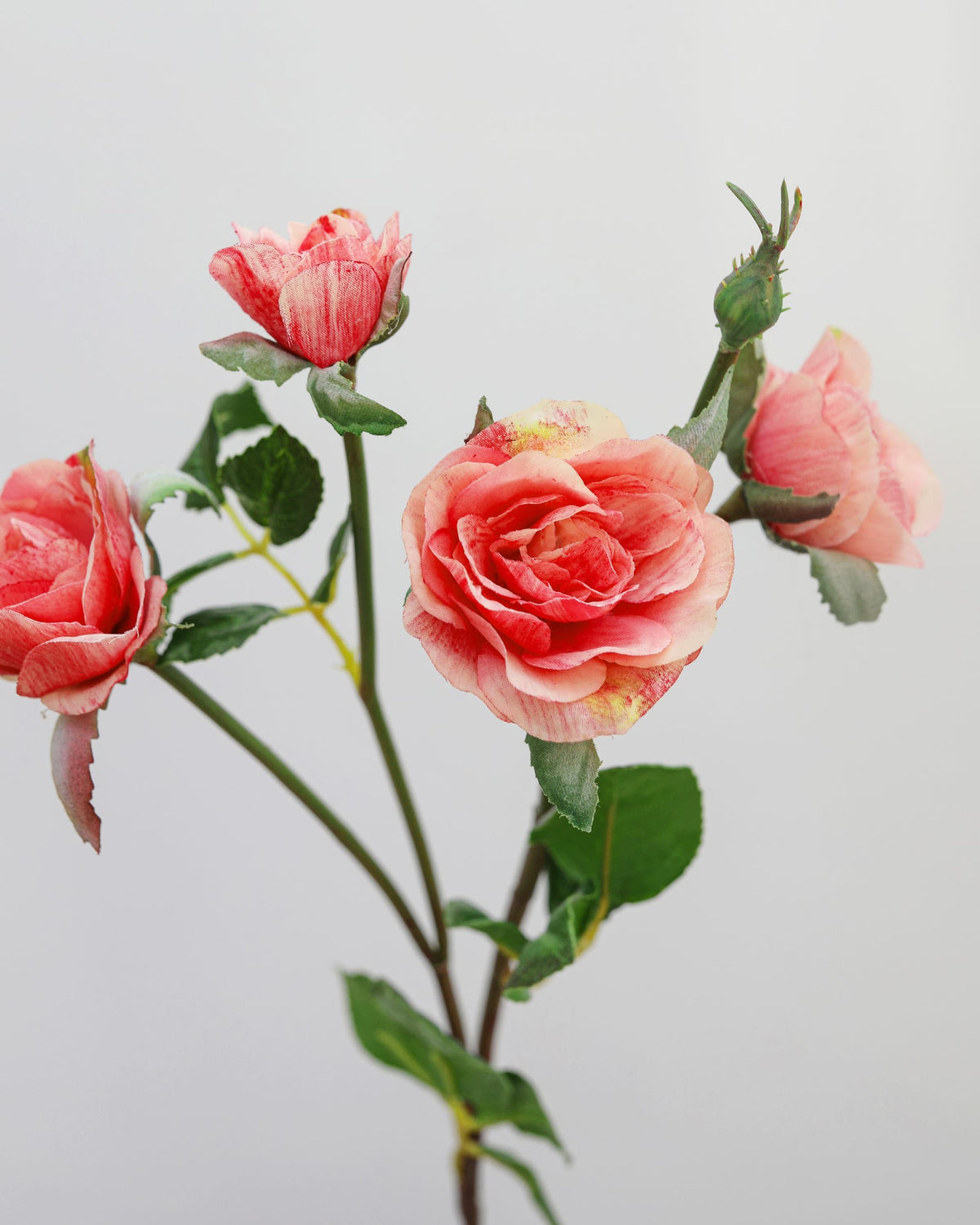 artificial pink rose spray close up 