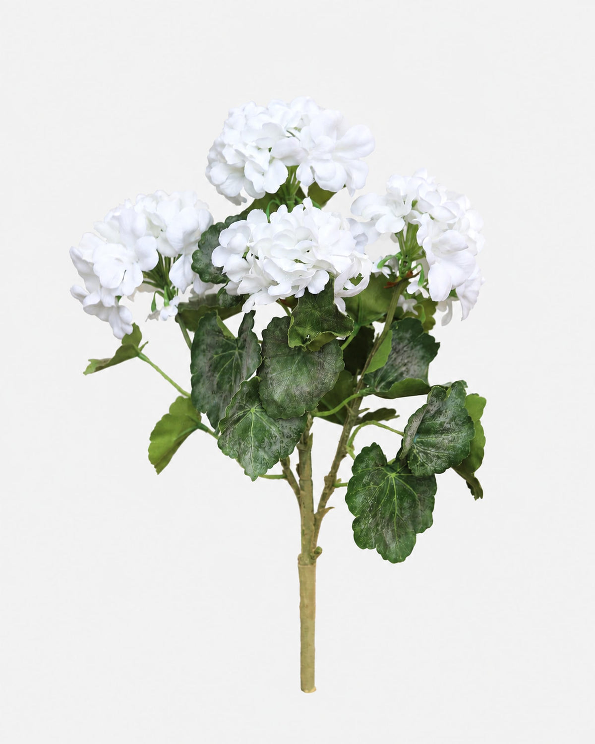 A single white artificial geranium stem with multiple round white blooms, green leaves, and a tan stem on a plain light gray background.