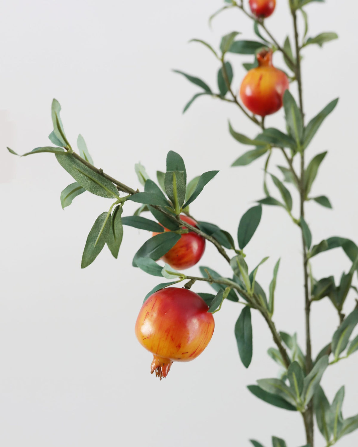 Artificial Pomegranate Branch close up 