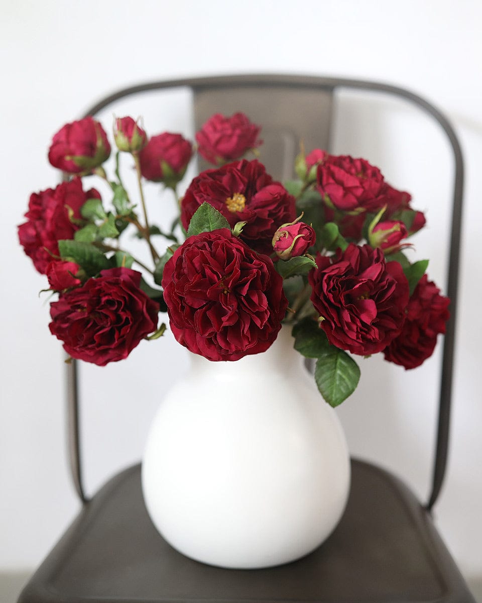 Red Artificial Rose Flowers in White Ceramic Vase