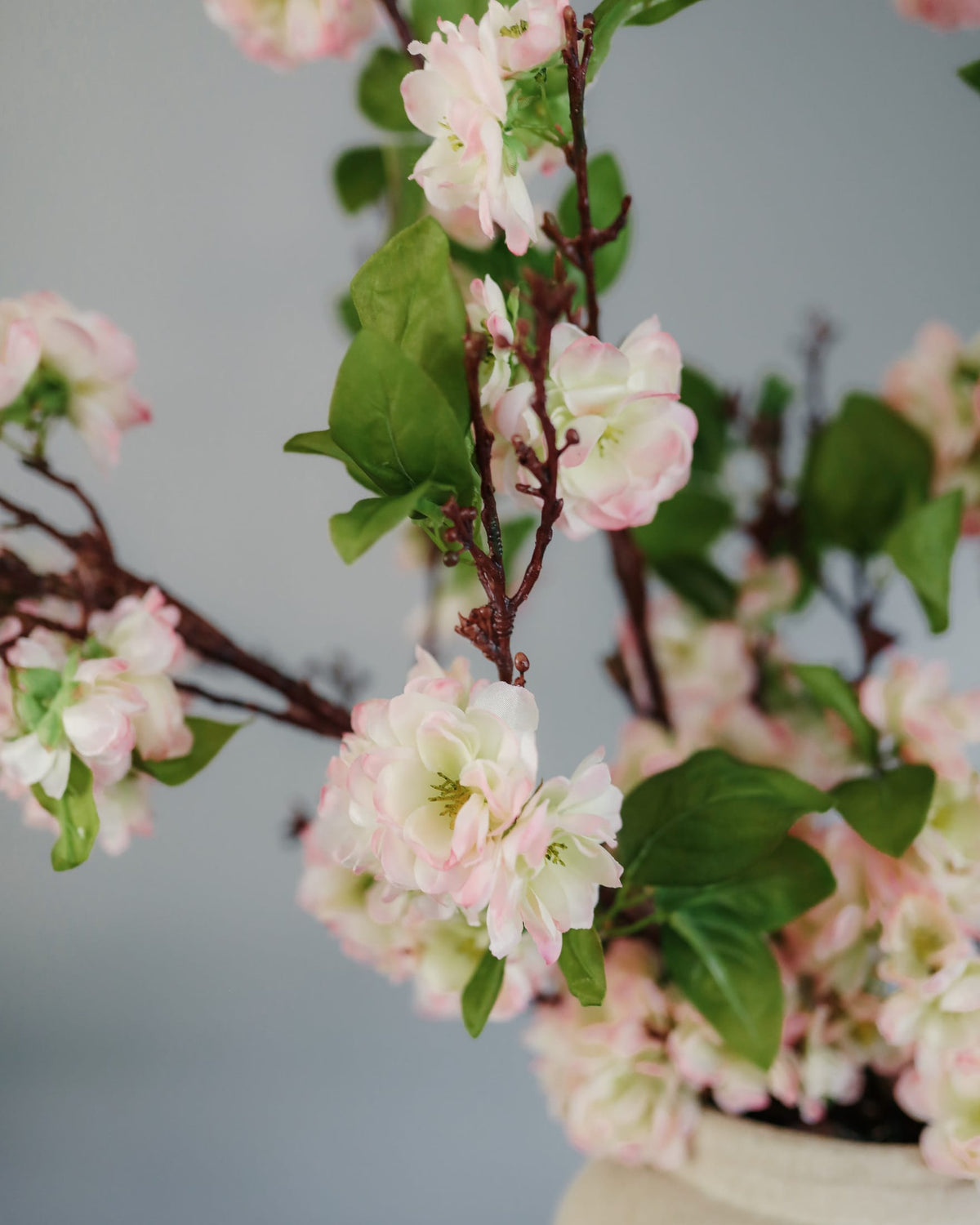 Faux Pink Cherry Blossom Branch close up 