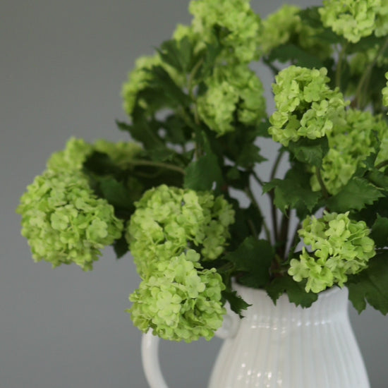 Video of Green Faux Snowballs in Pitcher Vase