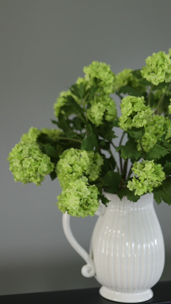 Video of Green Faux Snowballs in Pitcher Vase