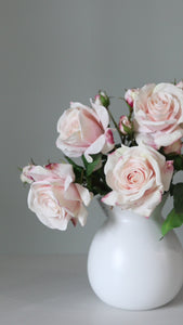Video of Pink Artificial Roses that Look Realistic in Vase