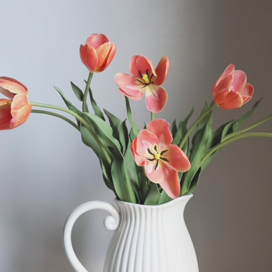 Artificial Orange Tulips Styled in Pitcher Vase