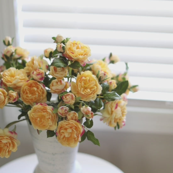 Yellow Artificial Roses Styled in White Vase