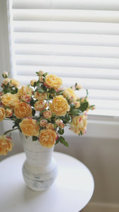 Yellow Artificial Roses Styled in White Vase