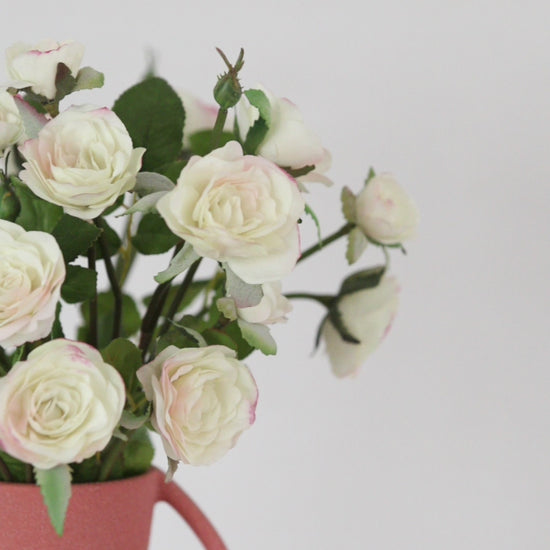 Video Clip Showcasing Mini White Faux Roses in Vase