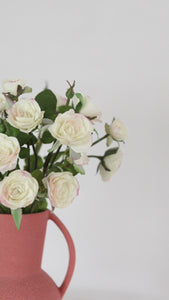 Video Clip Showcasing Mini White Faux Roses in Vase