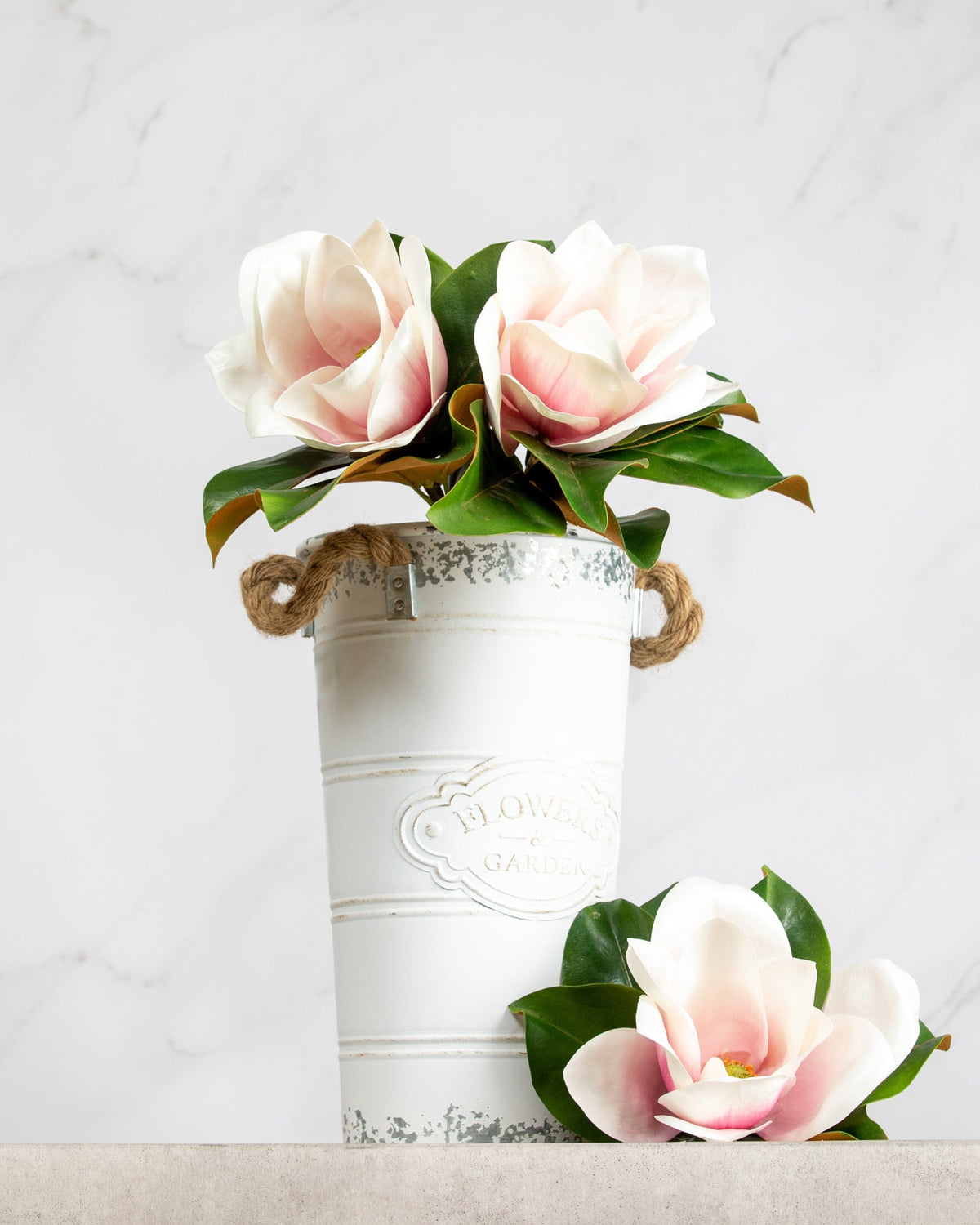 Prestige Botanicals Artificial Pink Magnolia Stems in a small white tin vase