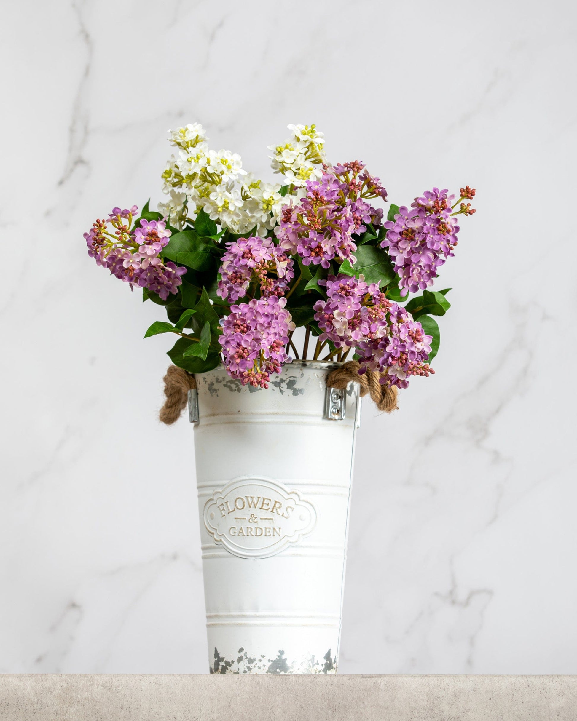 Prestige Botanicals Artificial Mauve Lilac Stems in a small tin vase