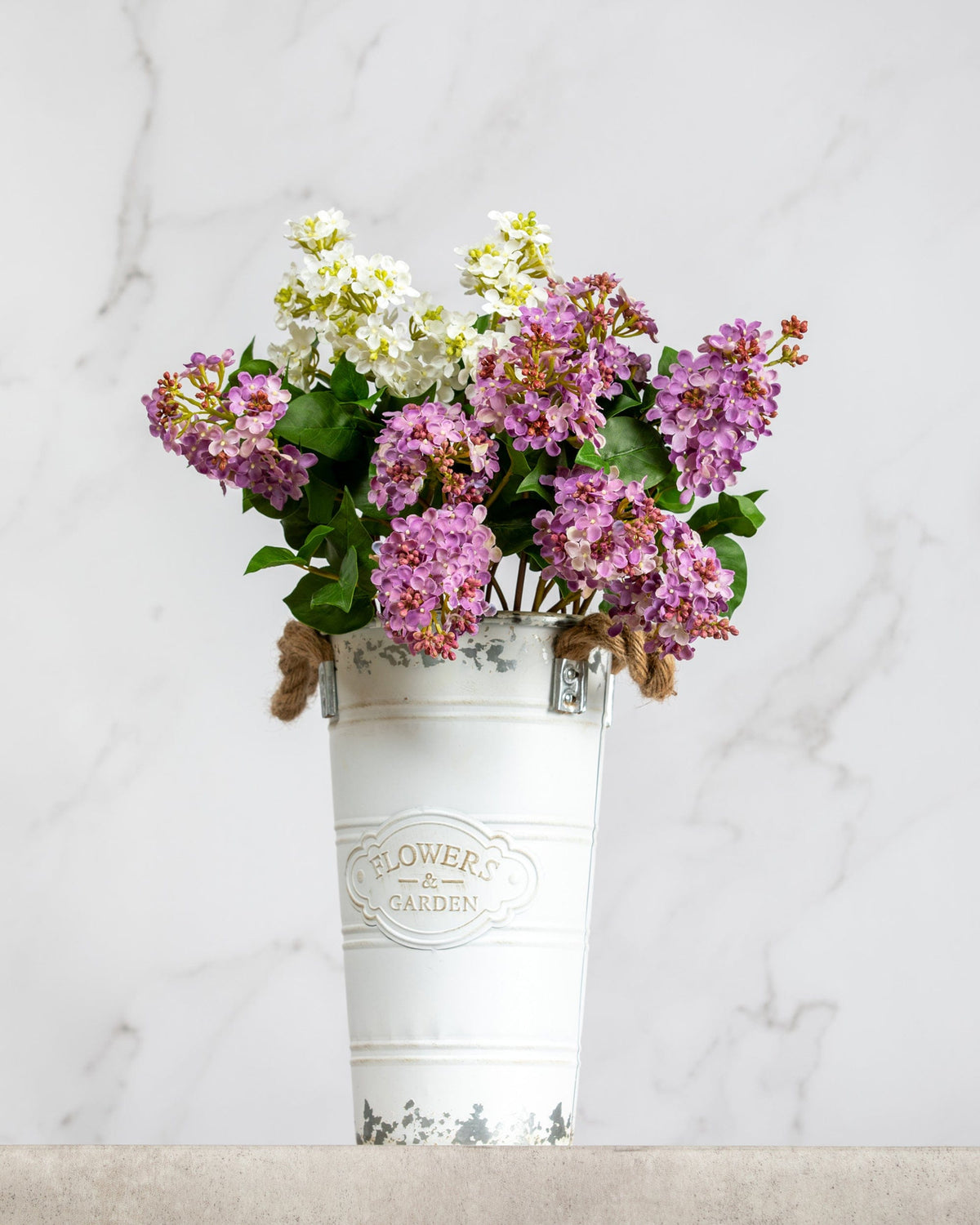 Prestige Botanicals Artificial Mauve Lilac Stems in a small tin vase