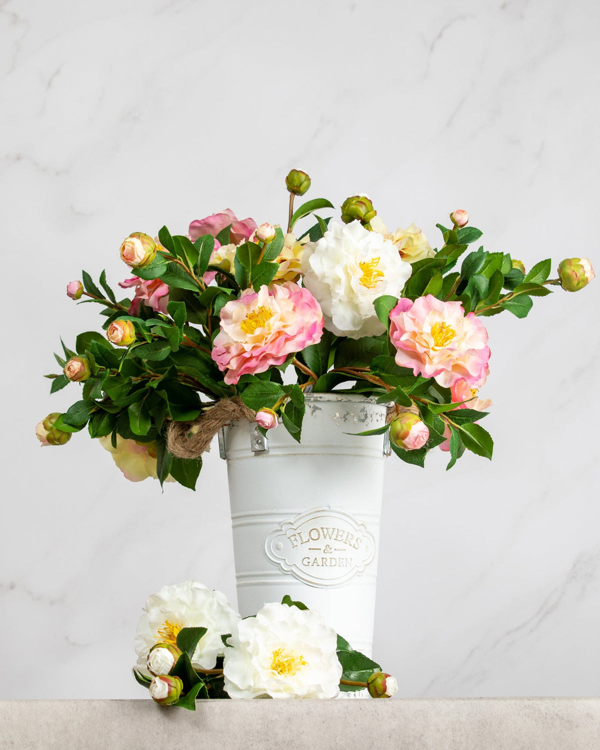 Prestige Botanicals Artificial Ruffle Camellia Stems in a white tin vase