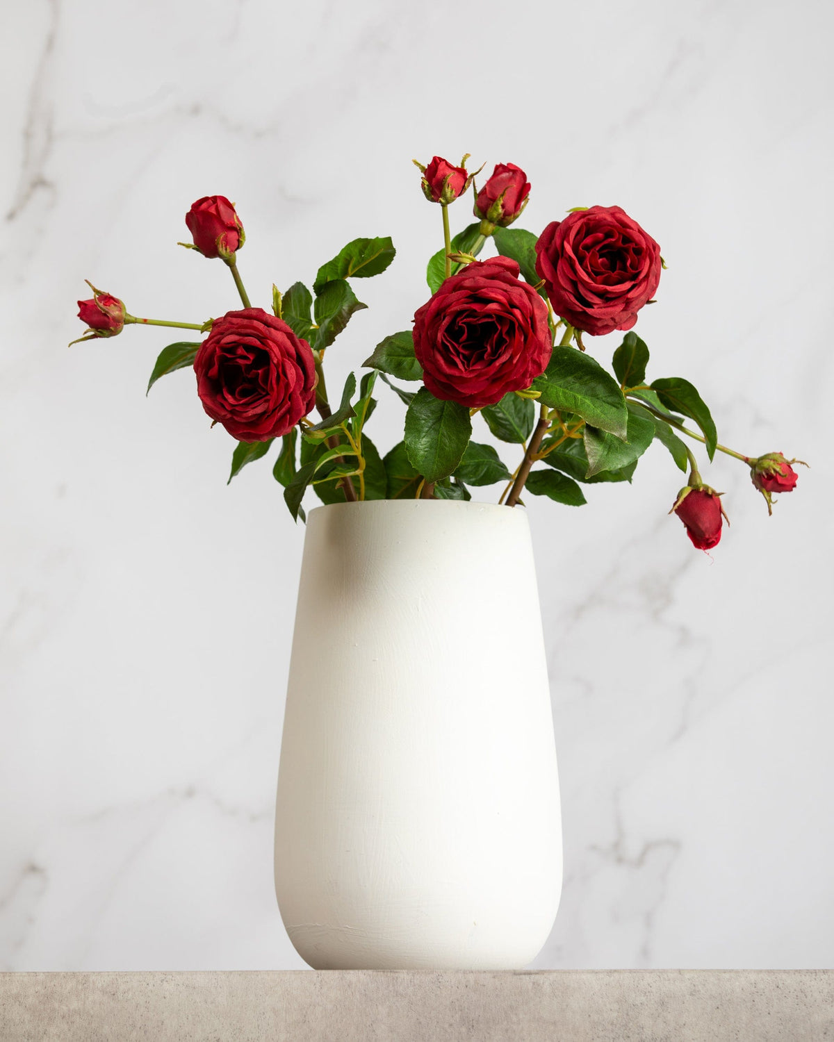 Prestige Botanicals Artificial Red Ecuadorian Roses in a white vase for Valentines Day